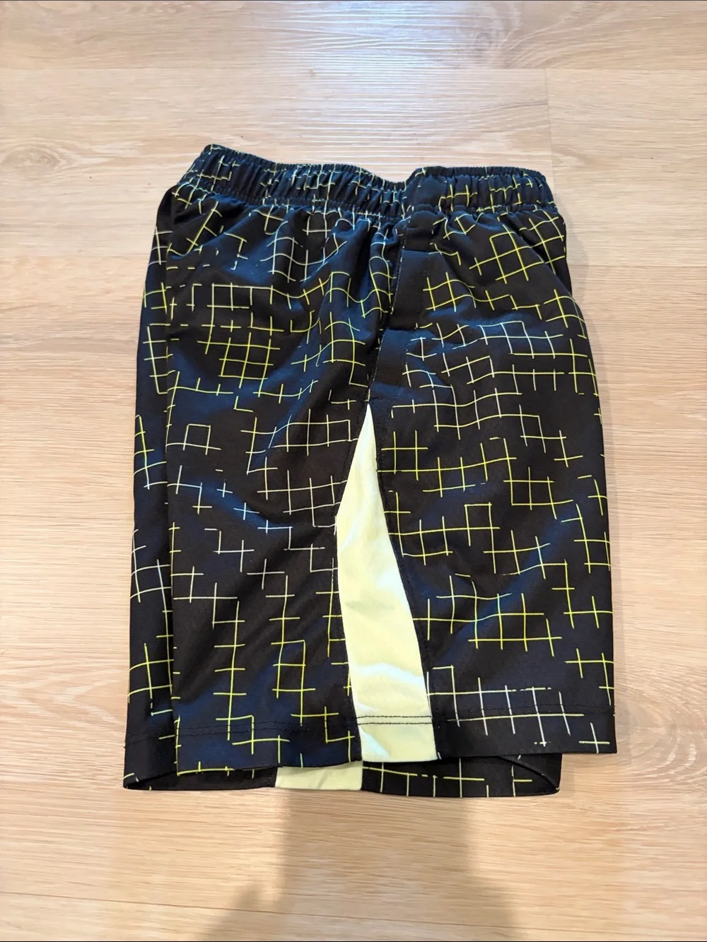 Nike Black Shorts with Yellow Grid and White Swoosh